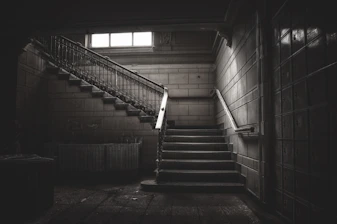 a set of stairs leading up to a window
