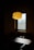A bright and stylish ceiling lamp illuminating a modern living room.