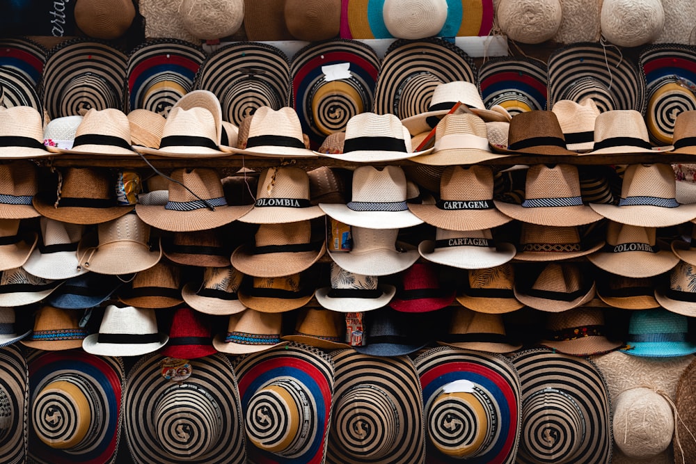 a wall full of hats and hats for sale