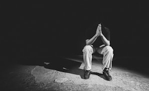An intimate moment of prayer and reflection in a church.