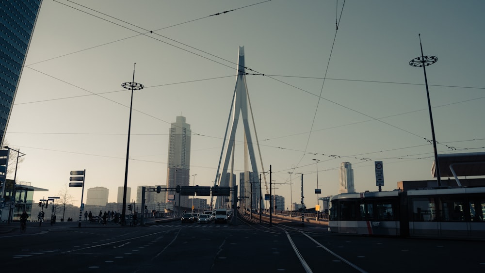 a city street with a train on the tracks