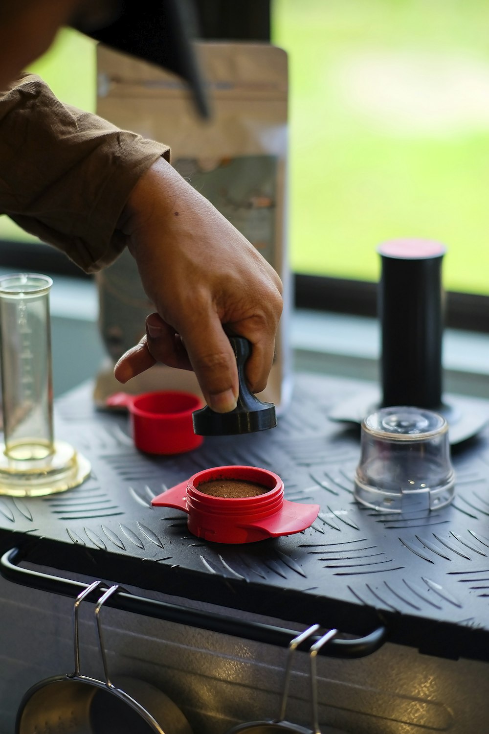 a person is pressing a button on a stove