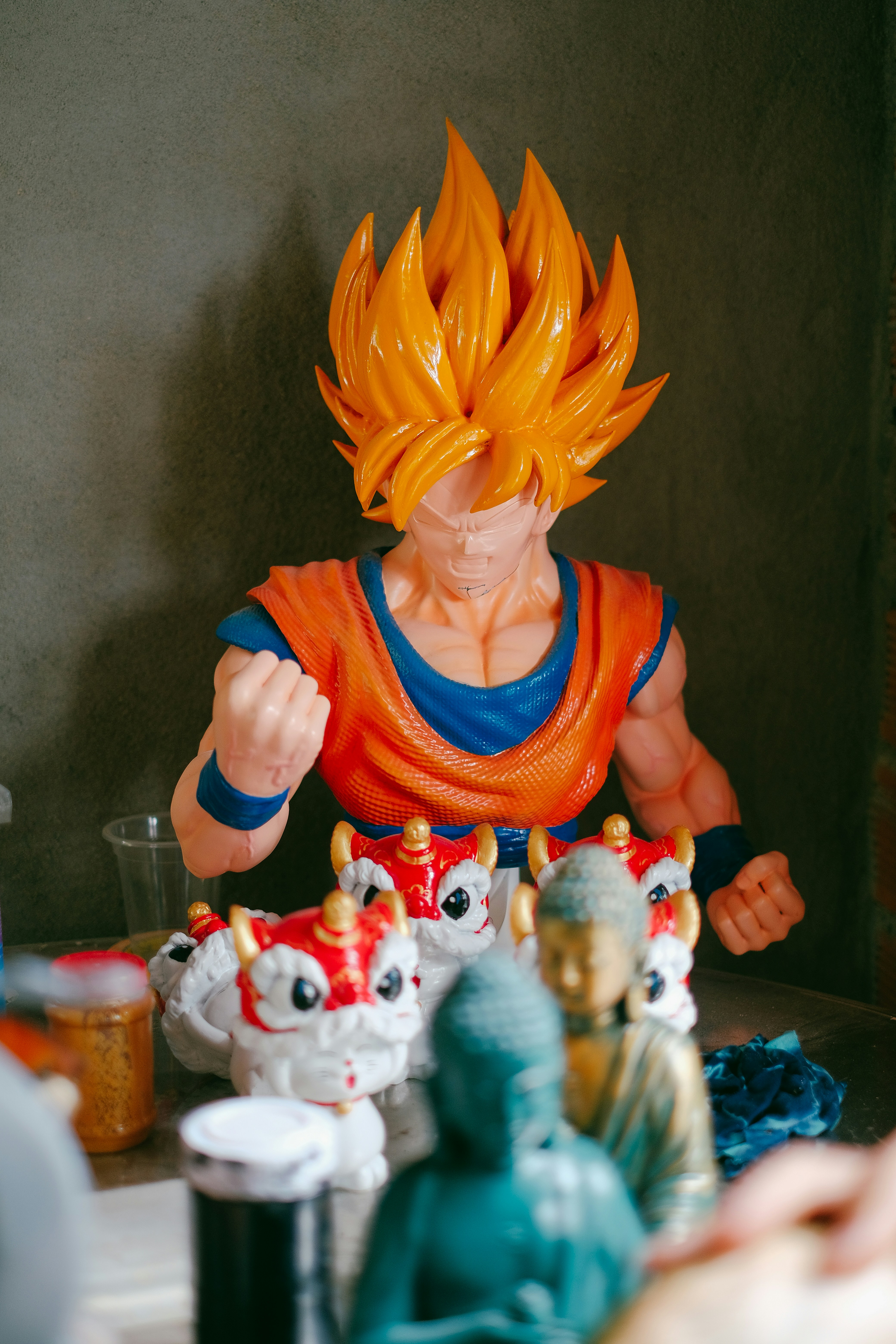 A dragon figurine sitting on top of a table photo – Free Woman Image on ...