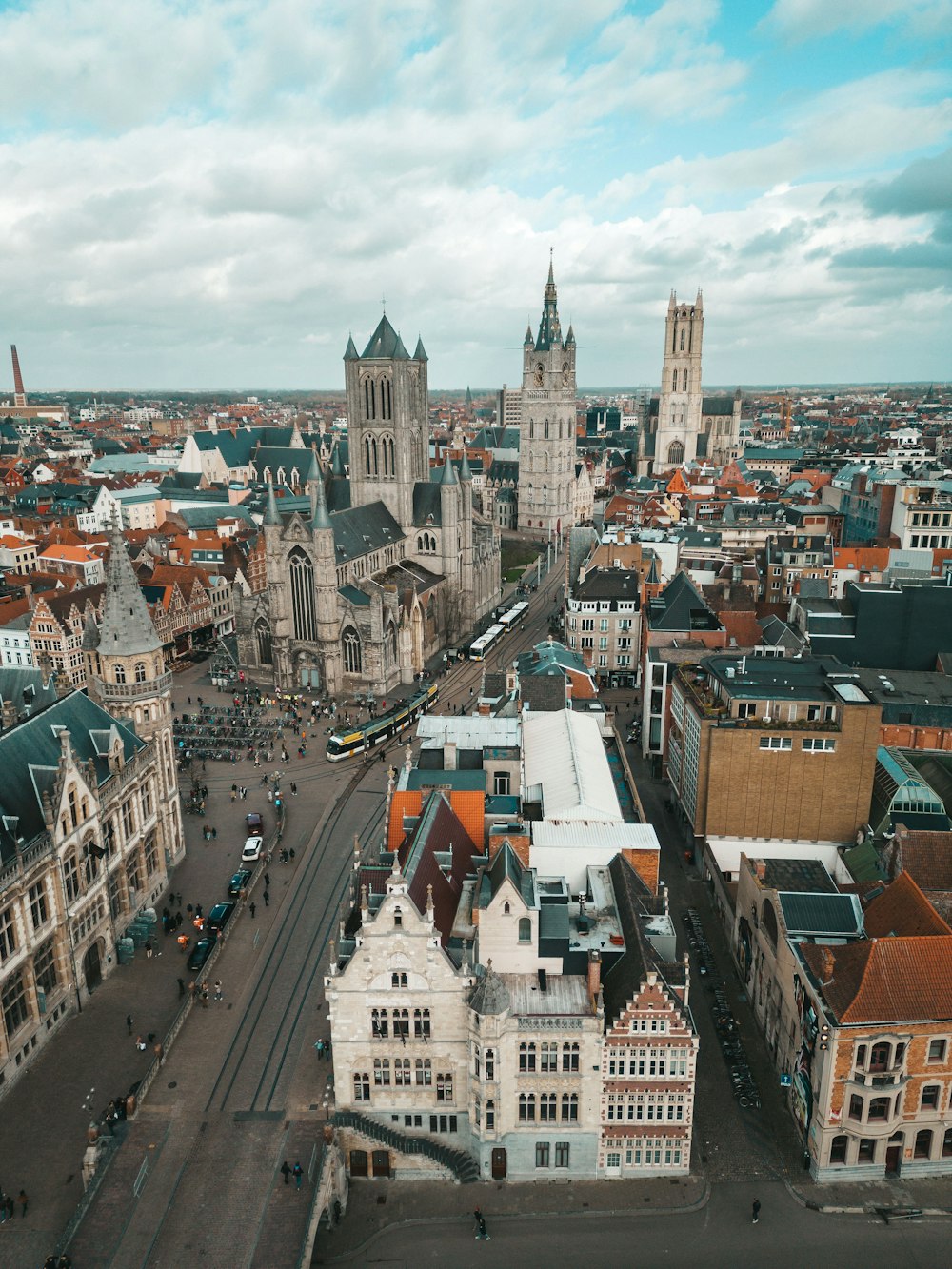 an aerial view of a city with tall buildings