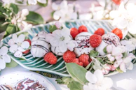 An elegant dessert plate showcasing a rich chocolate creation garnished with fresh berries.