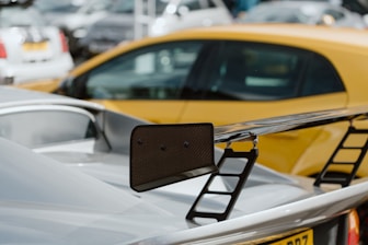 a close up of a car parked in a parking lot