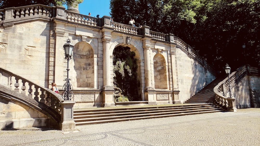 a stone building with a staircase leading up to it