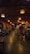 A warm restaurant interior with happy customers enjoying their meals.