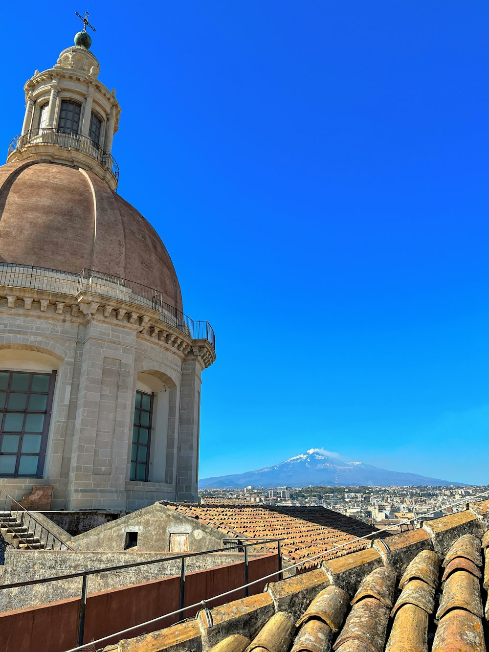 a view of a dome with a mountain in the background