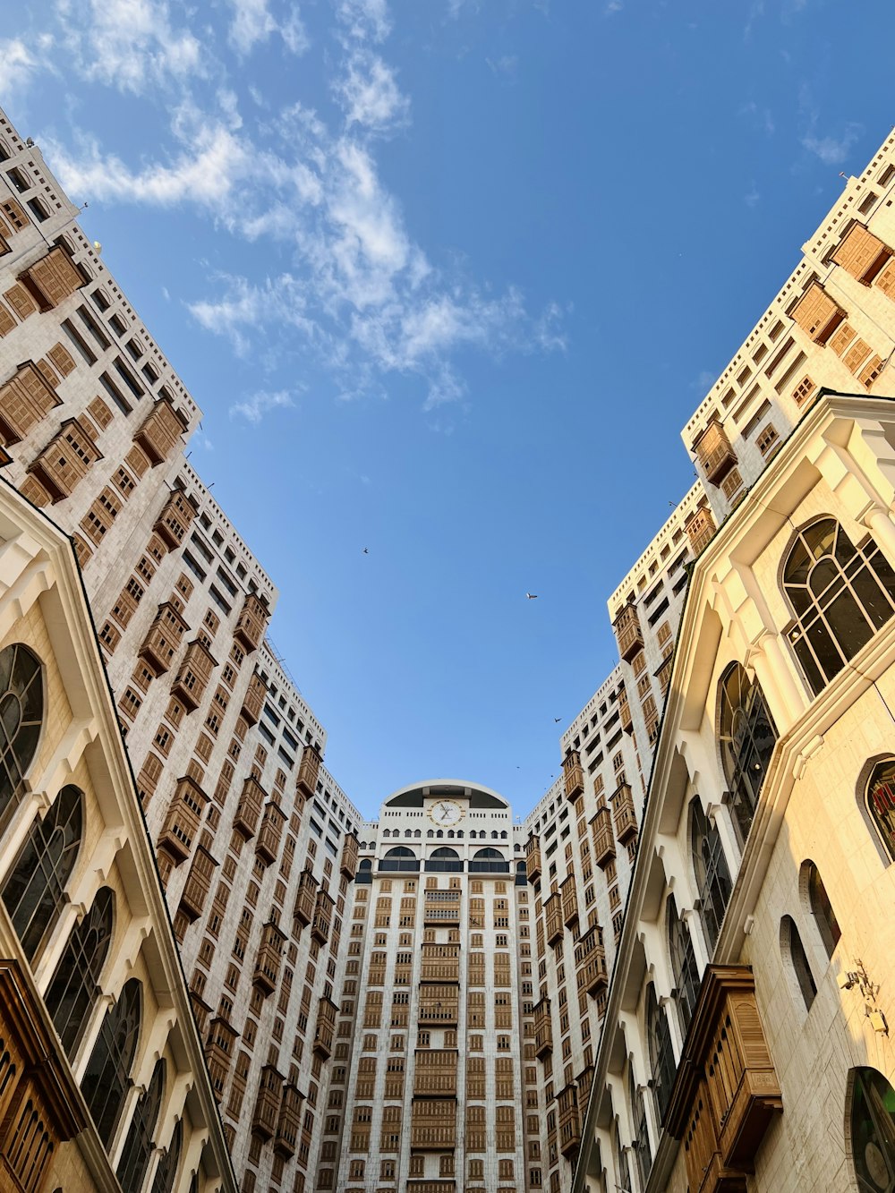 a very tall building with a sky background