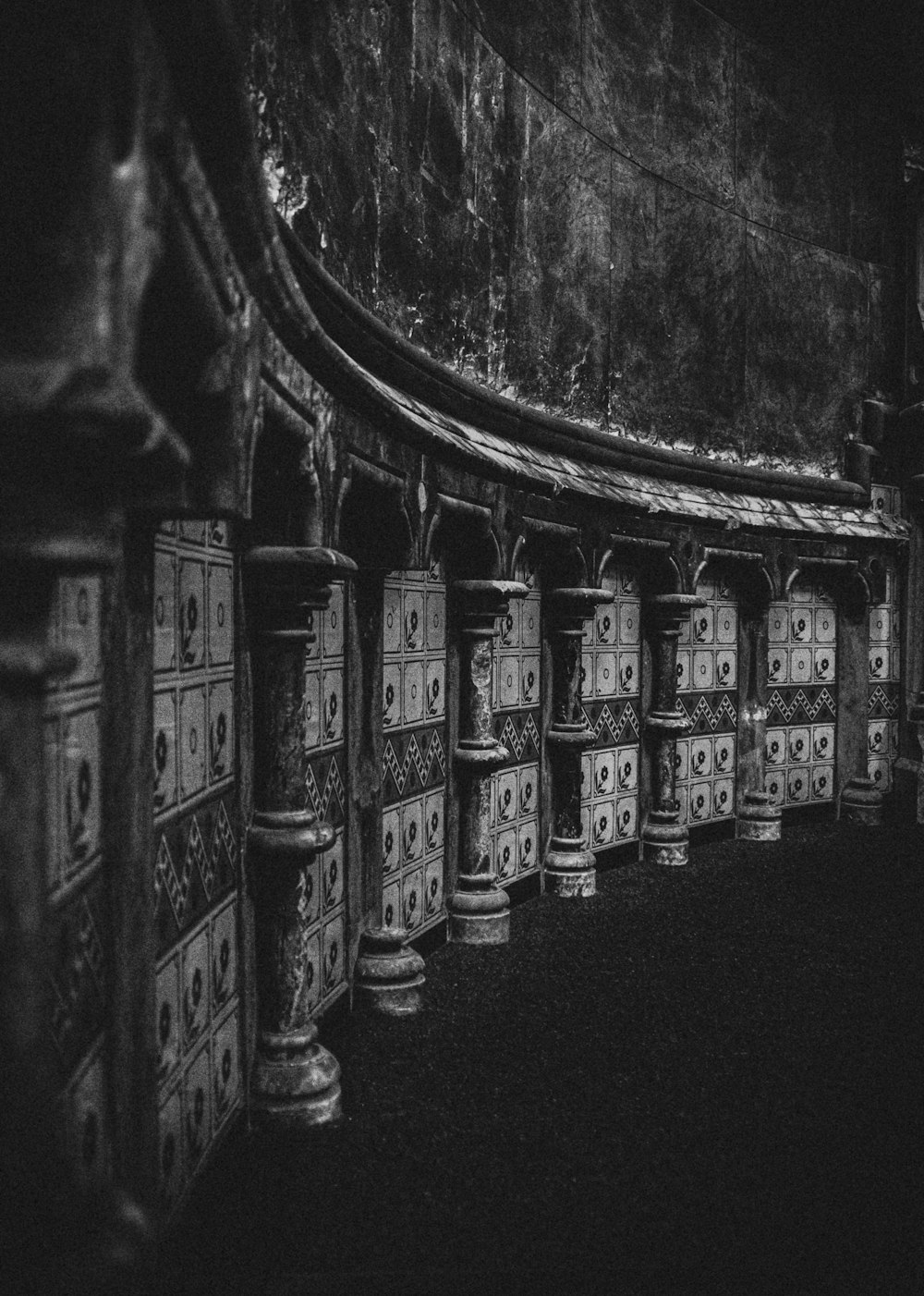 a black and white photo of a row of drawers