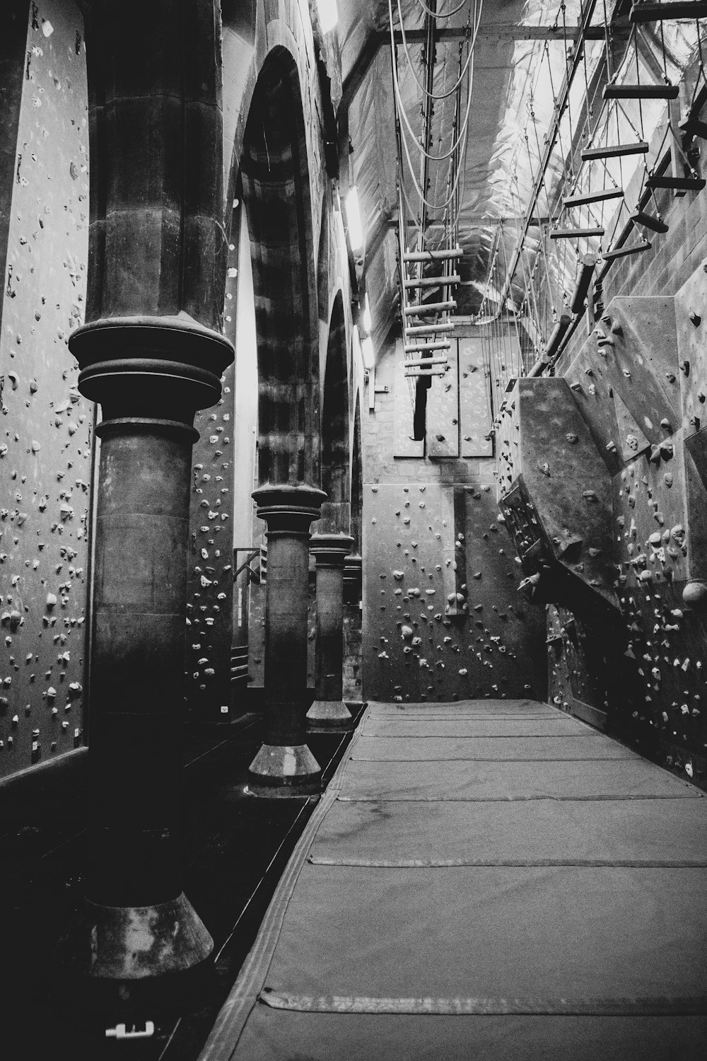 a black and white photo of a train station