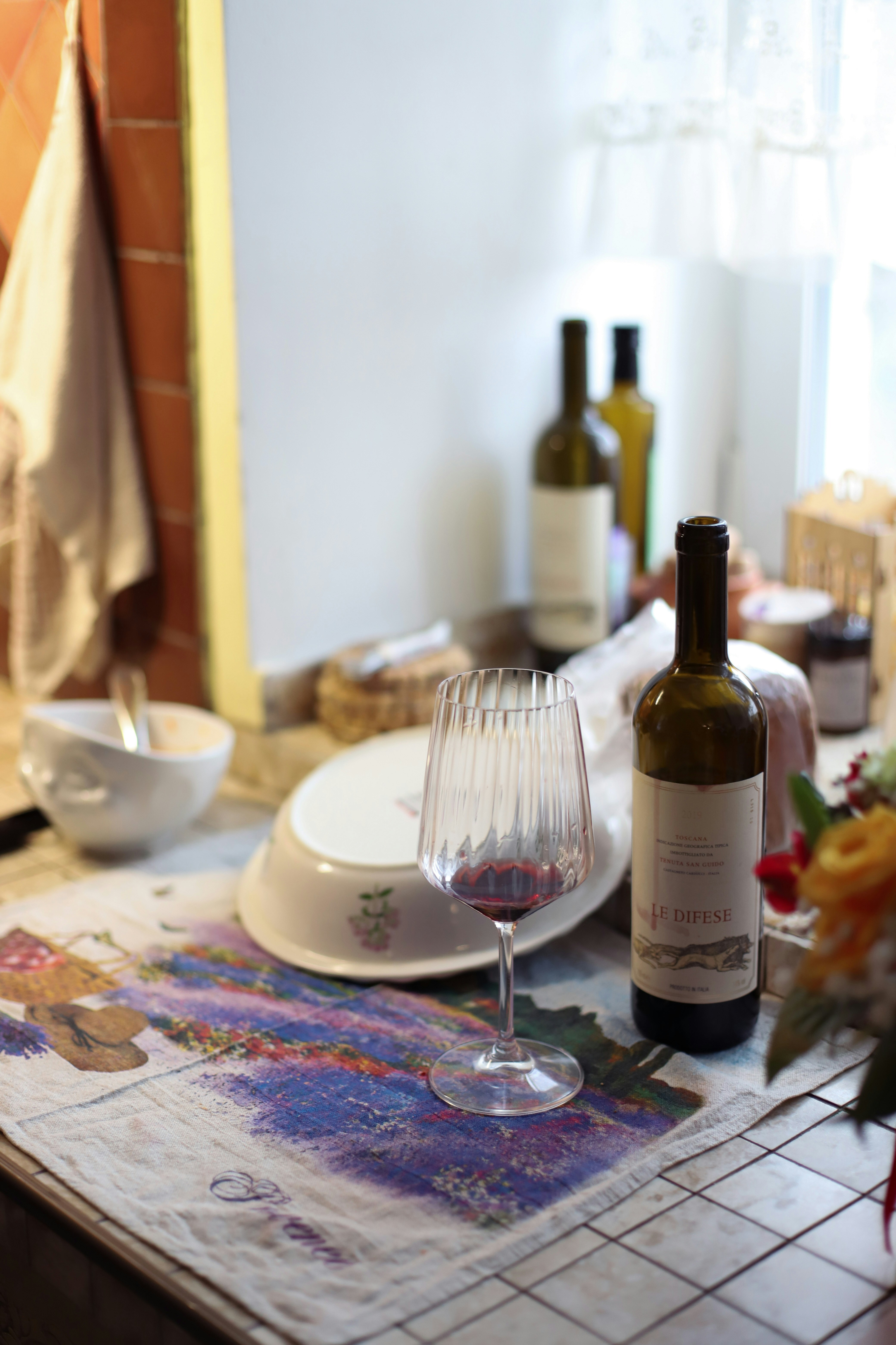A bottle of wine sitting on top of a table photo – Free Wine bottle ...