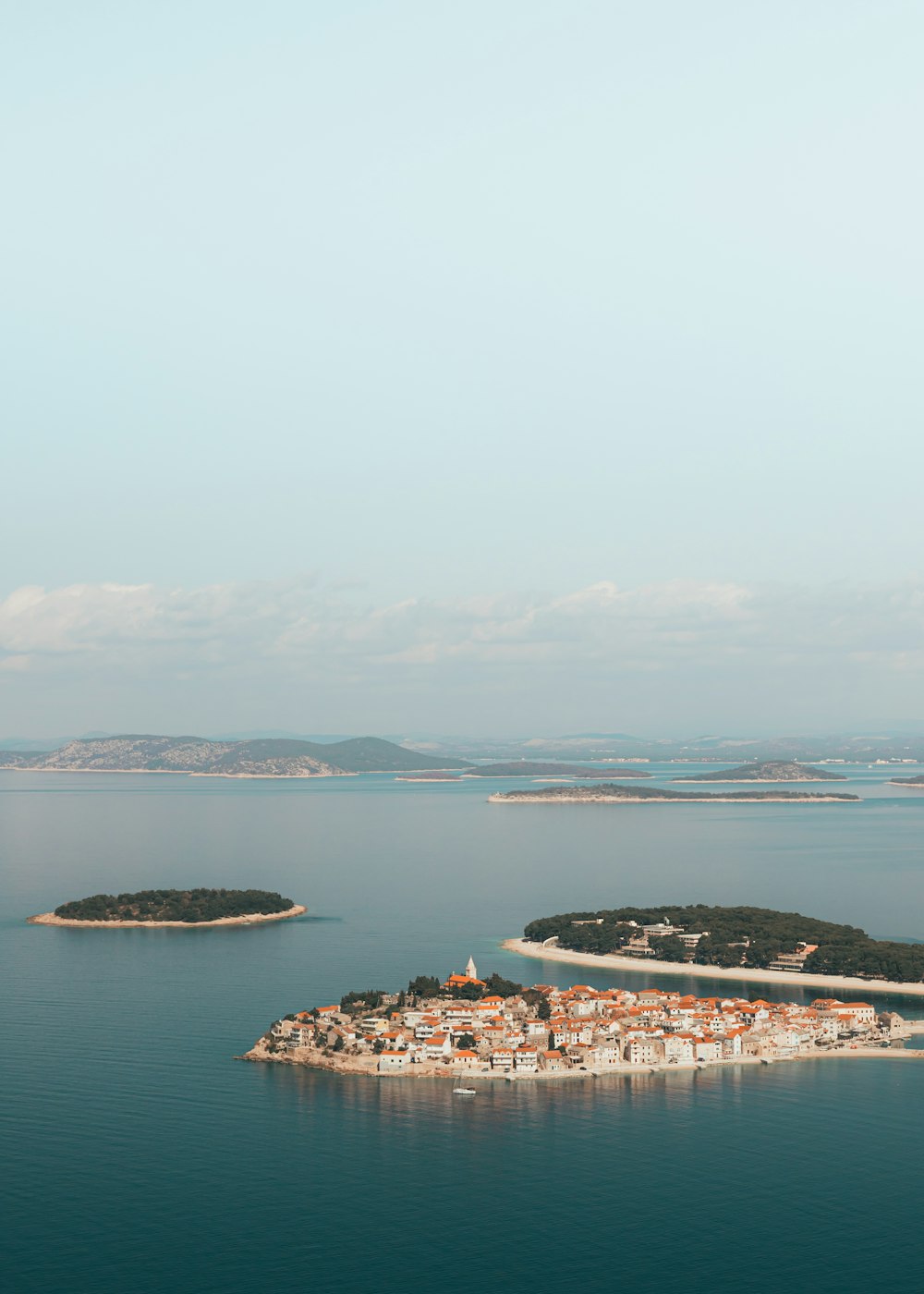 a small island in the middle of a large body of water