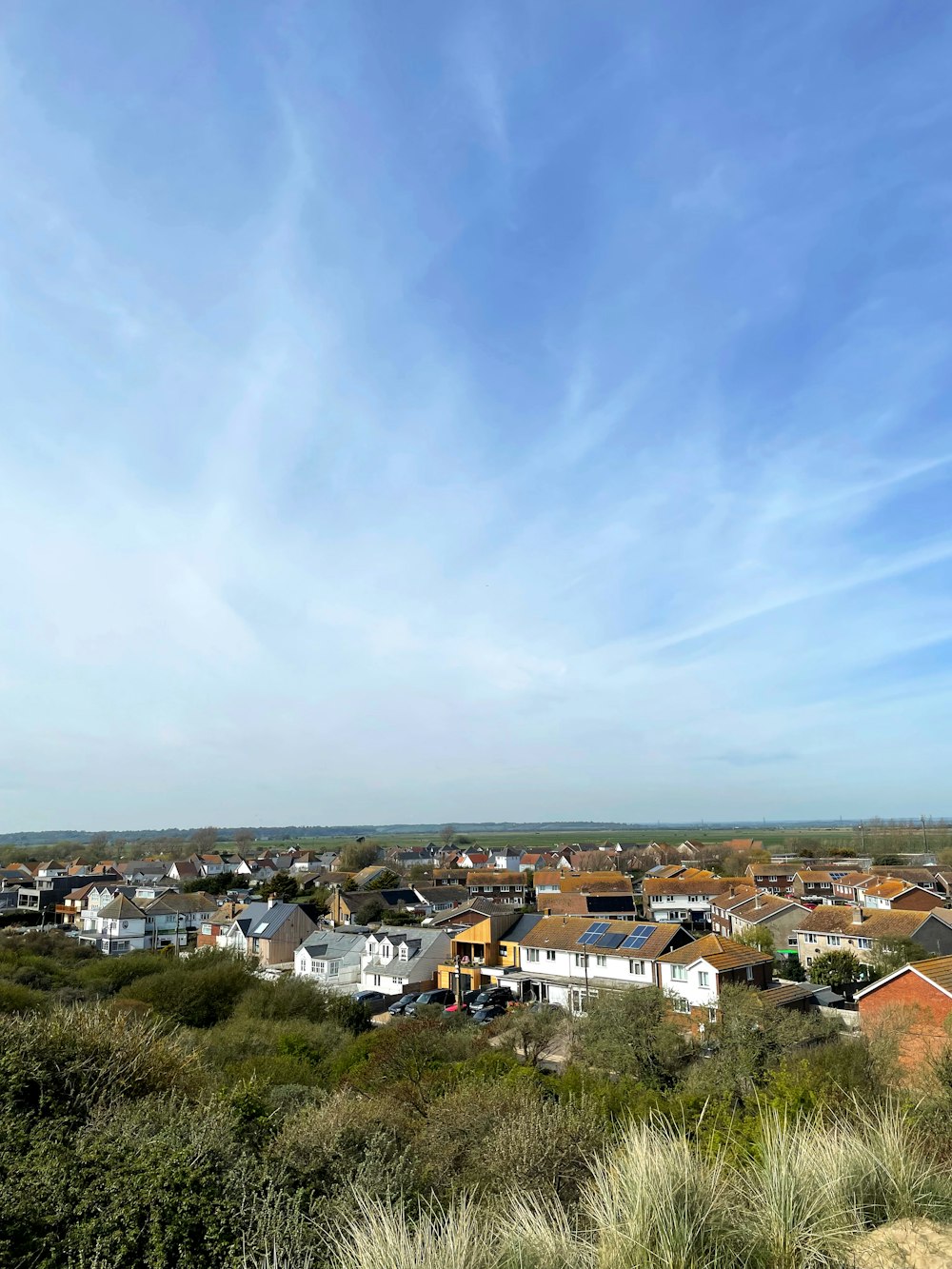 a view of a small town from a hill