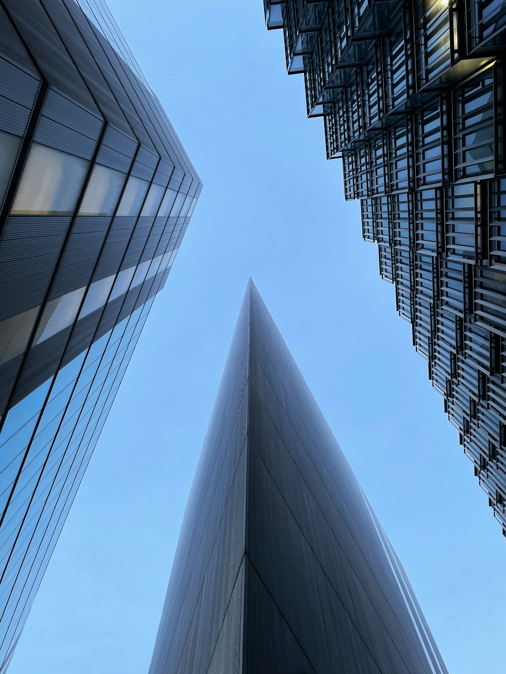 looking up at the side of a tall building