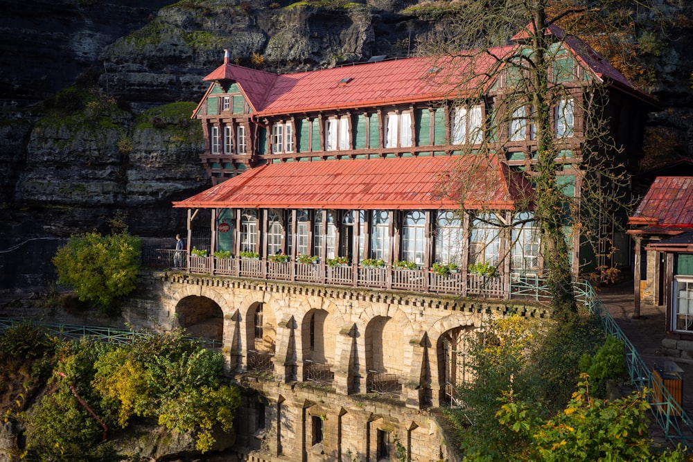 a building with a red roof and a red roof