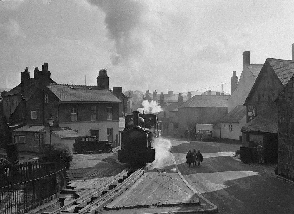 a black and white photo of a train on a track