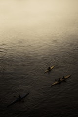 Kayakers paddling through calm waters near Vero Beach.