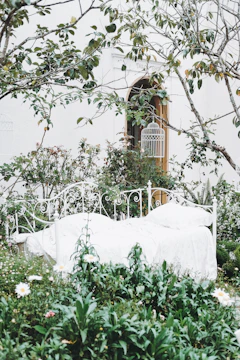 A stylish bed skirt showcased in a garden area.