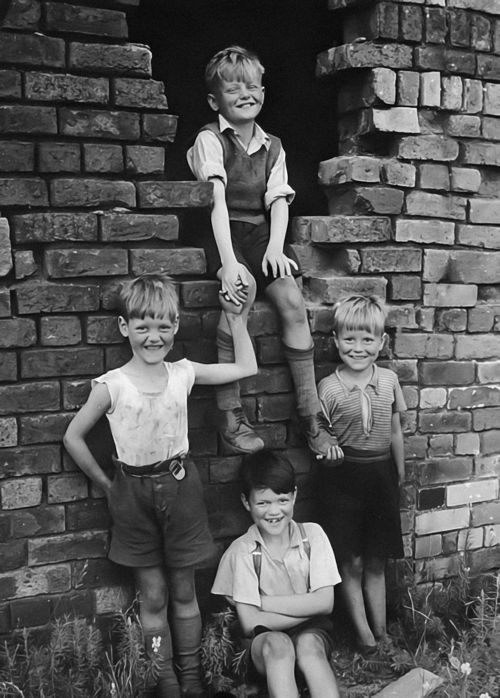 a black and white photo of a group of children