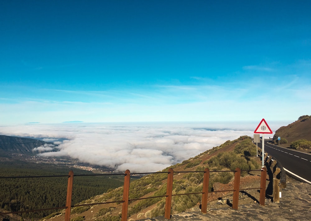 a view of a road with a sign on the side of it