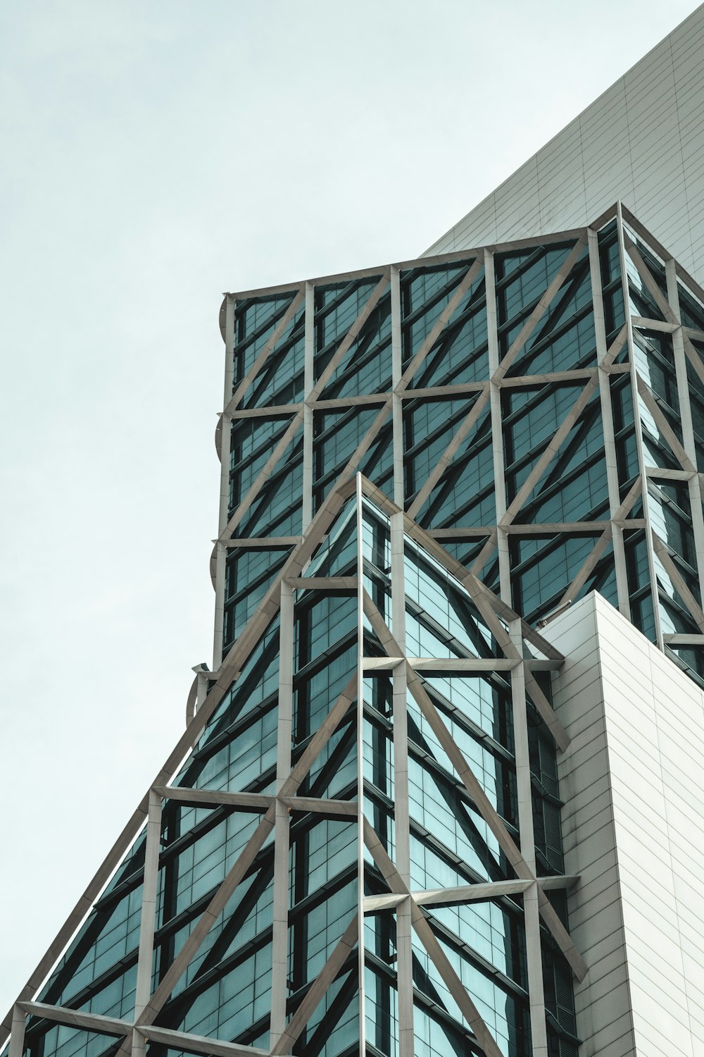 a very tall building with a clock on it's side