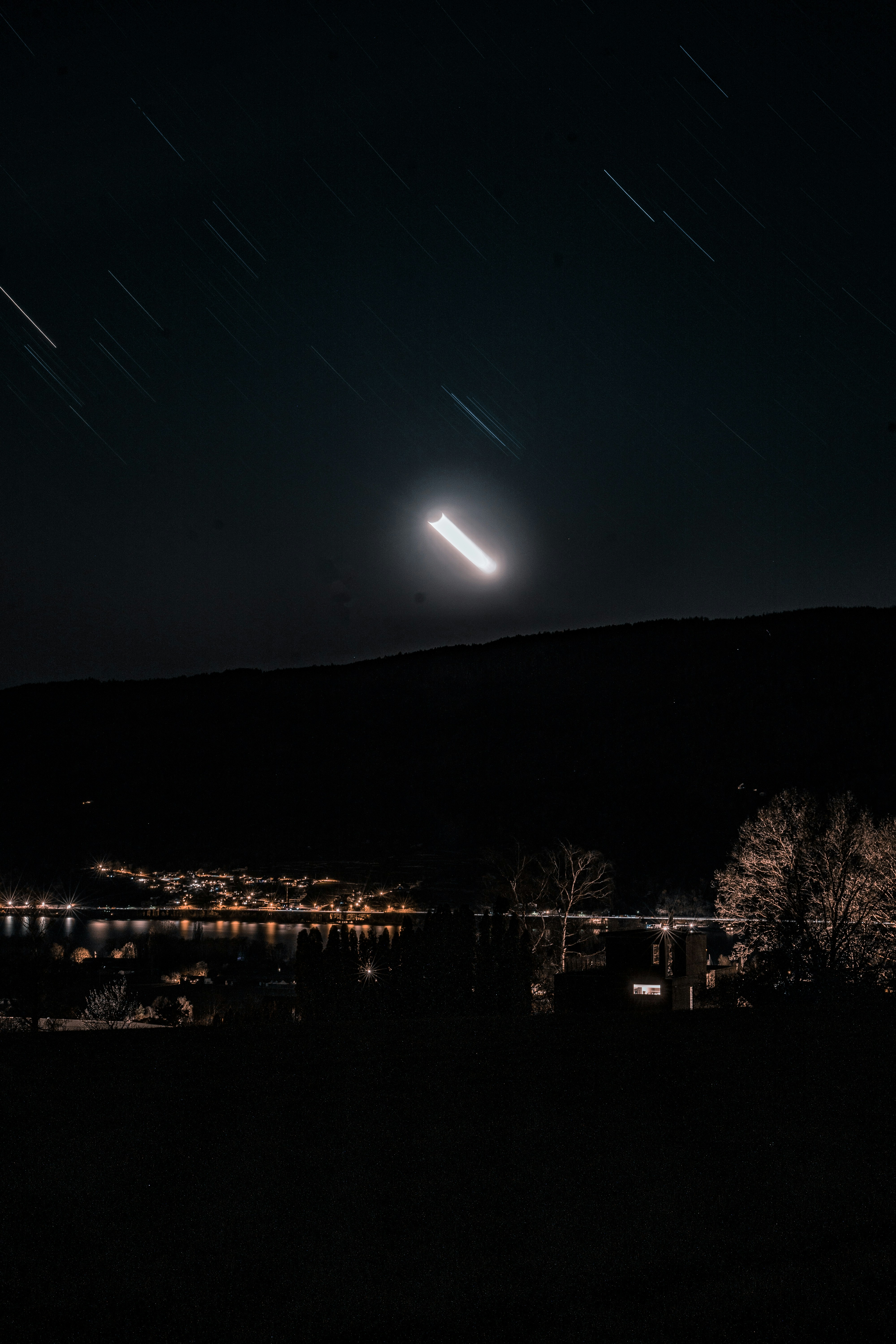 A large object is seen in the night sky photo – Free Nature Image on ...