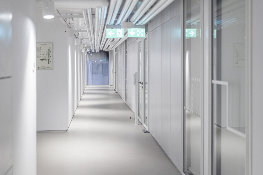 a long hallway with a clock on the wall