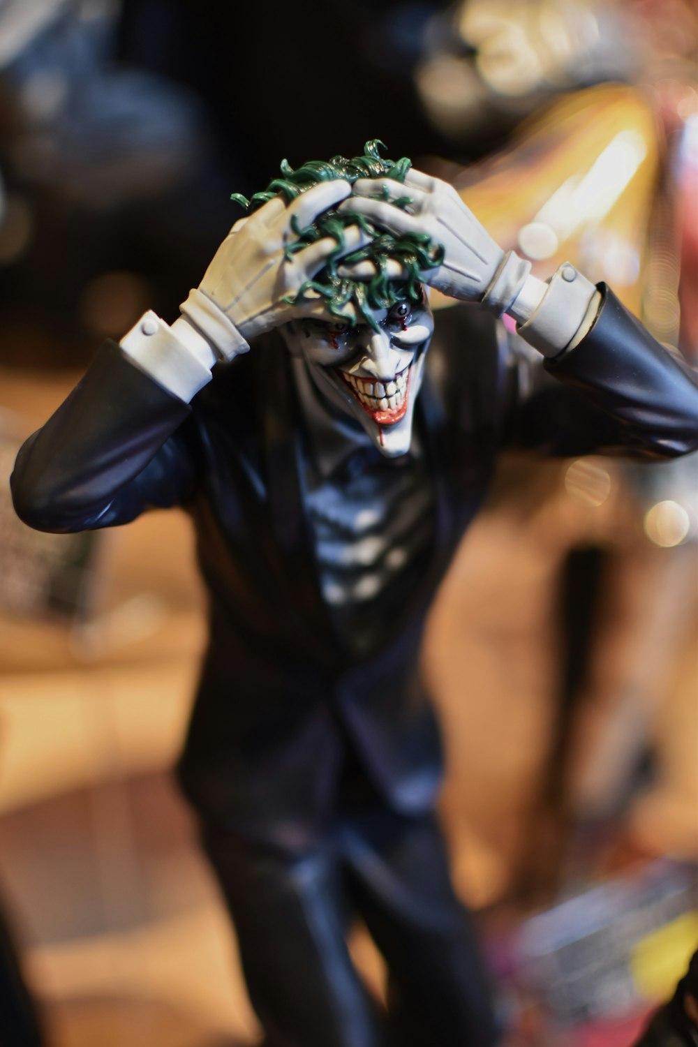a close up of a figurine of a joker