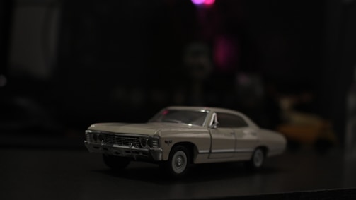 An artistic shot of a classic model car in natural light.