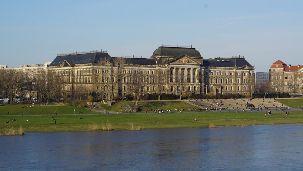a large building next to a body of water