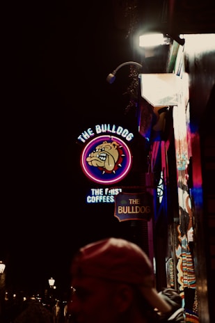 A roofing bulldog mascot sign proudly displayed on a newly finished home.