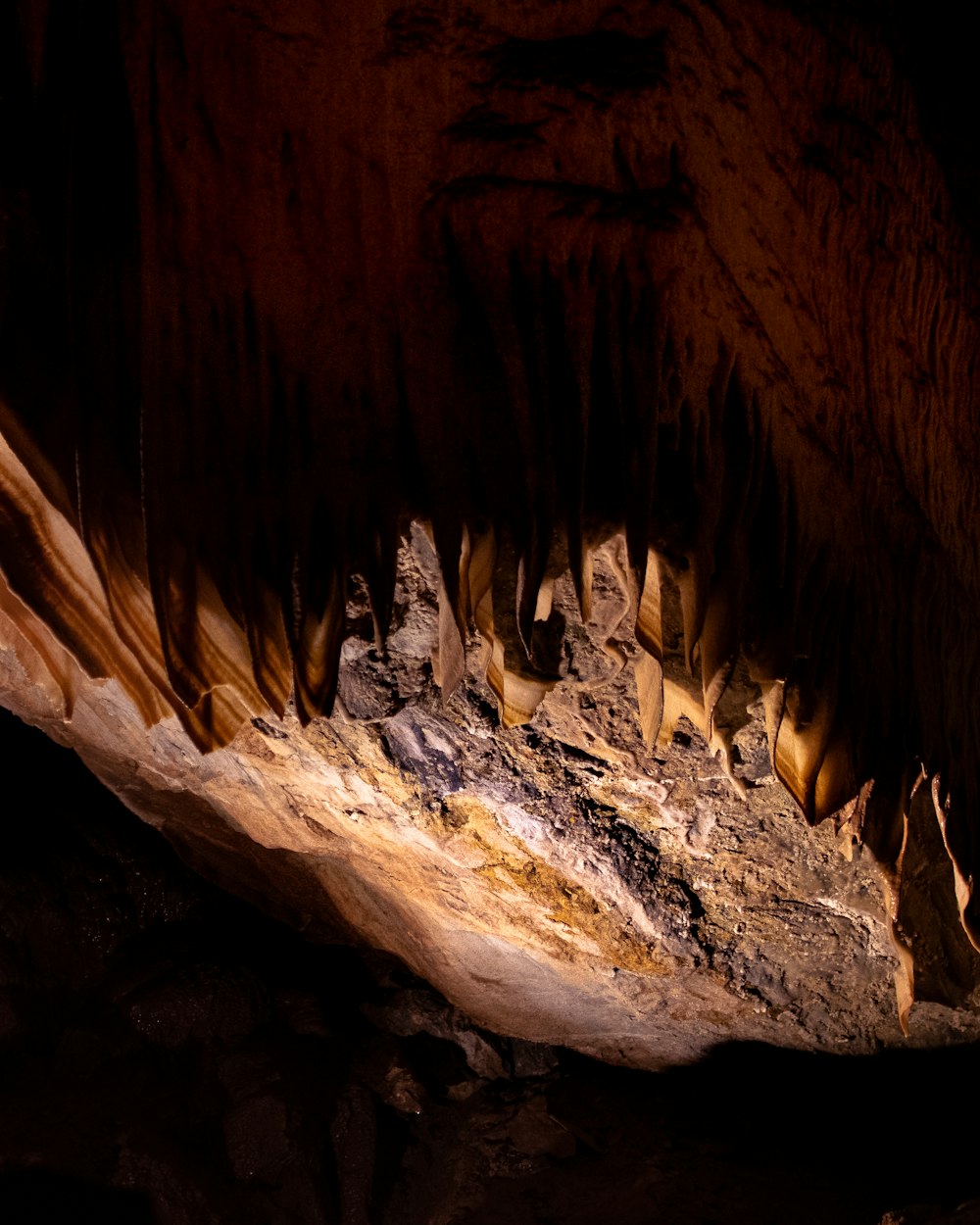 a cave with a very large rock formation