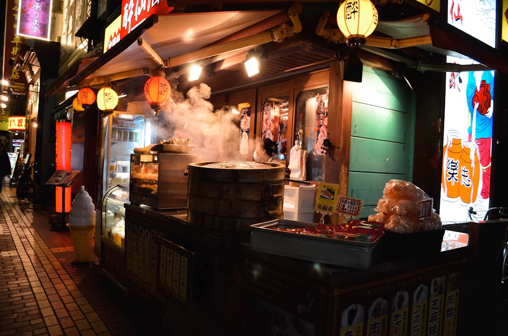 a food stand with smoke coming out of it