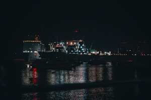 a large boat floating on top of a body of water