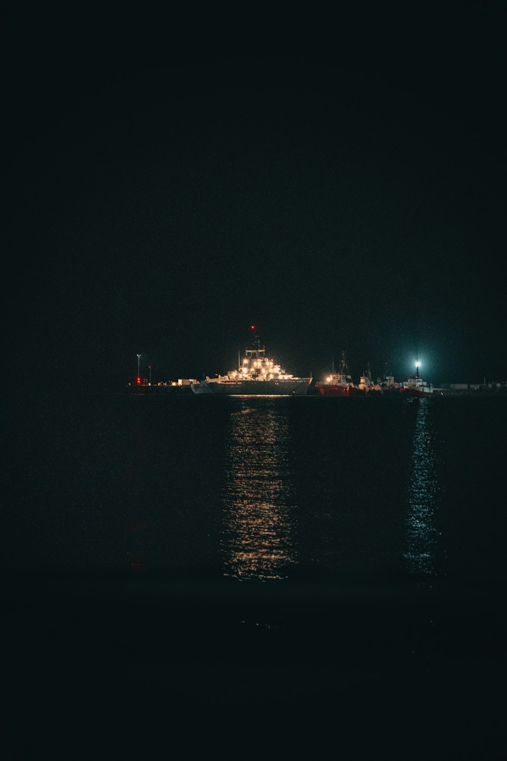 a large ship floating on top of a body of water