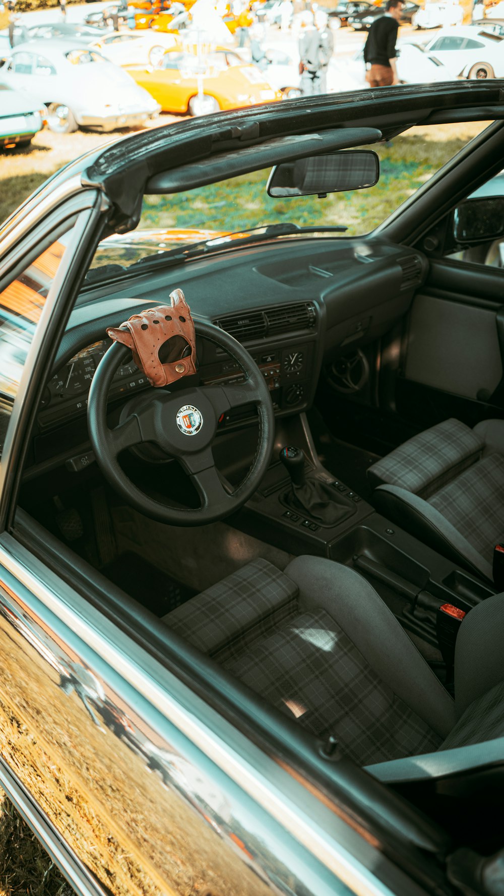 the interior of a car with a steering wheel