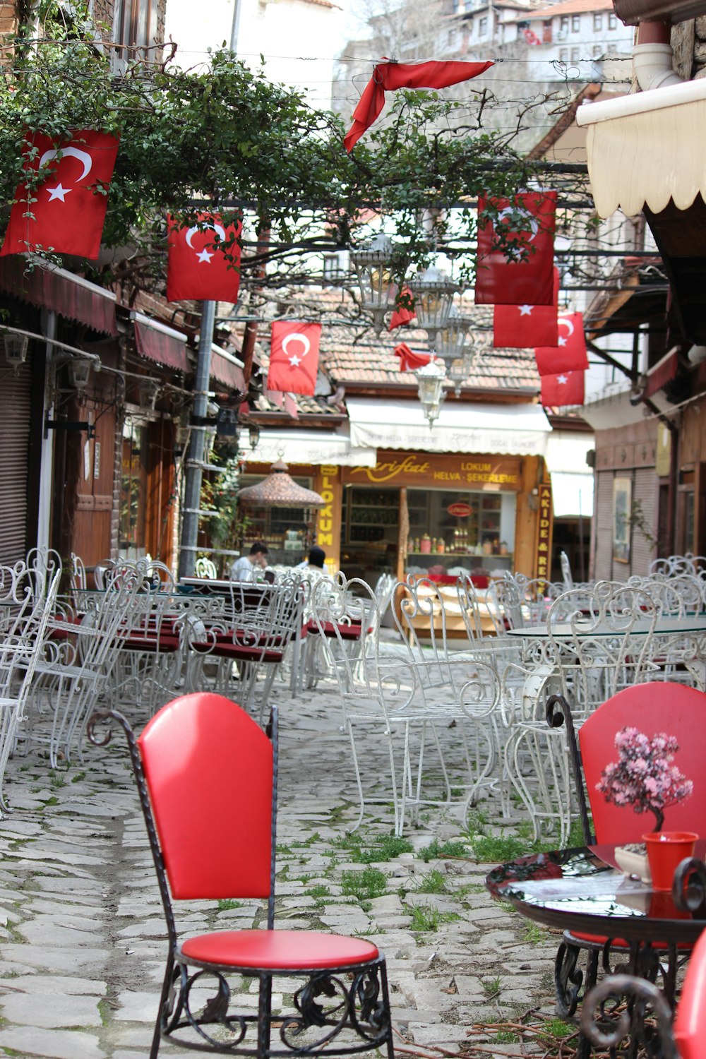 a couple of red chairs sitting next to each other