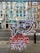 The image features a neon sign with an abstract design depicting elements like a building structure and a fish. The sign includes text that is mirrored, displayed in vibrant colors. It hangs against a backdrop of a street view with classic architectural buildings in the background.