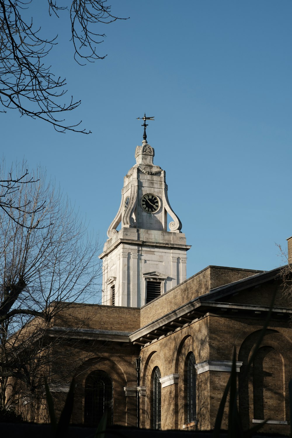 a church steeple with a clock on it