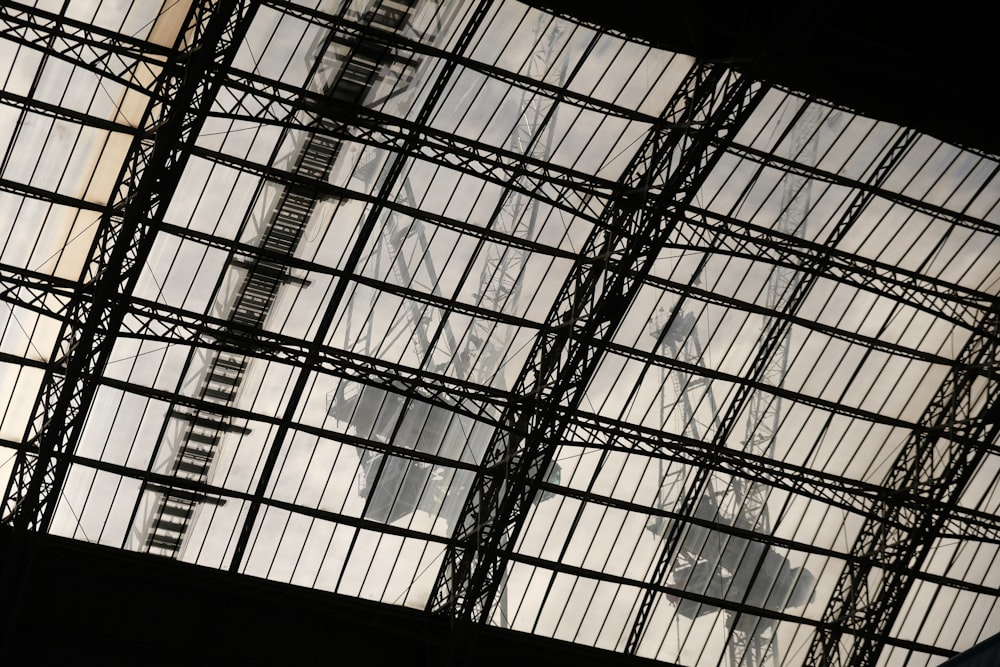 a large metal structure with a clock on it