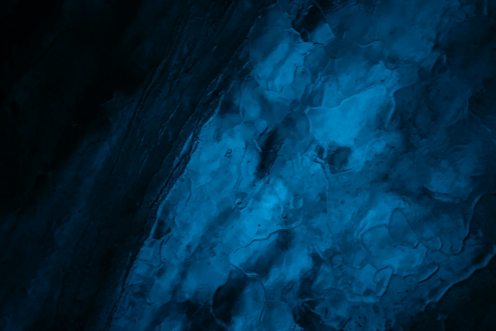 woman wearing yellow long-sleeved dress under white clouds and blue sky during daytime