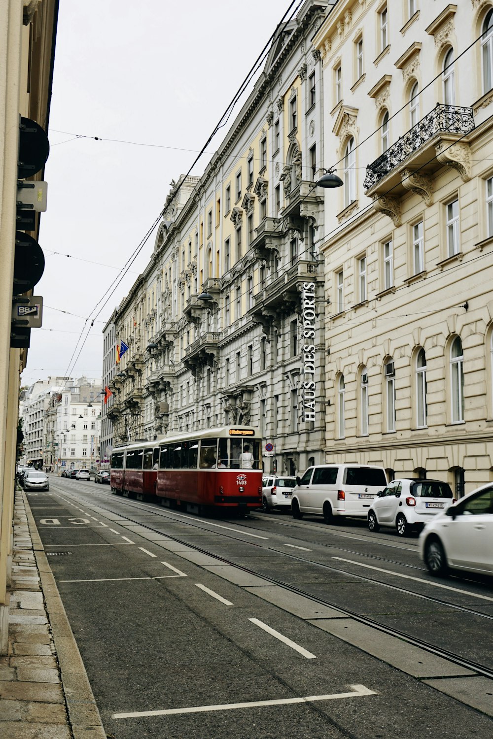 a street with cars and a bus on it