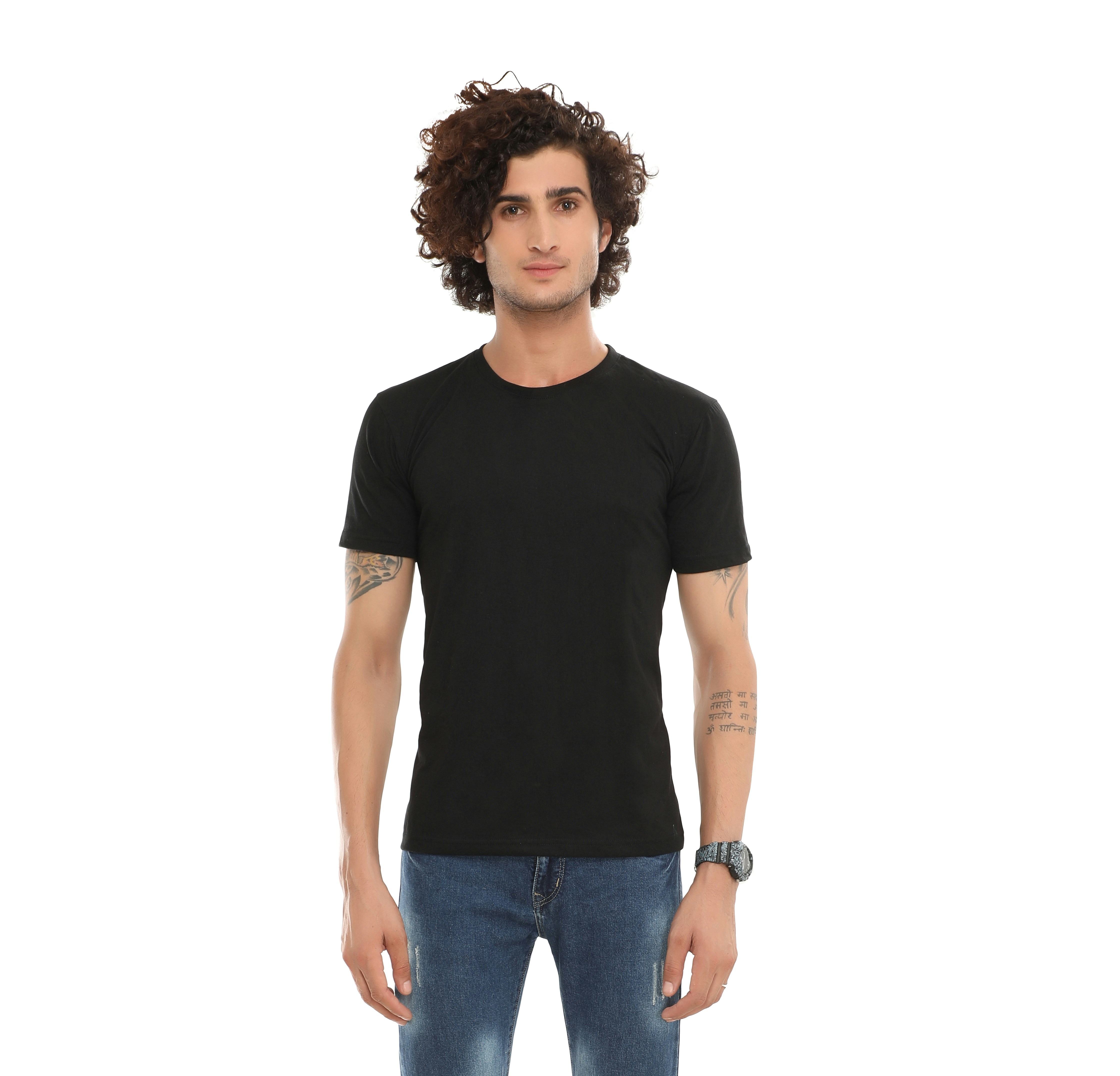 Man with curly hair wearing white shirt, neutral background