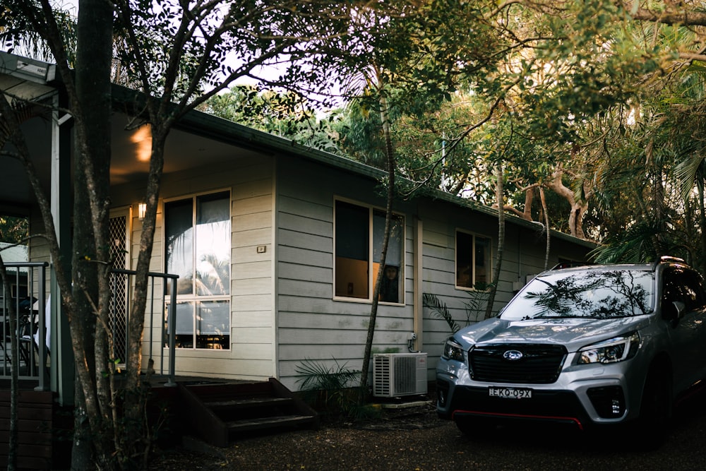 a car parked in front of a house