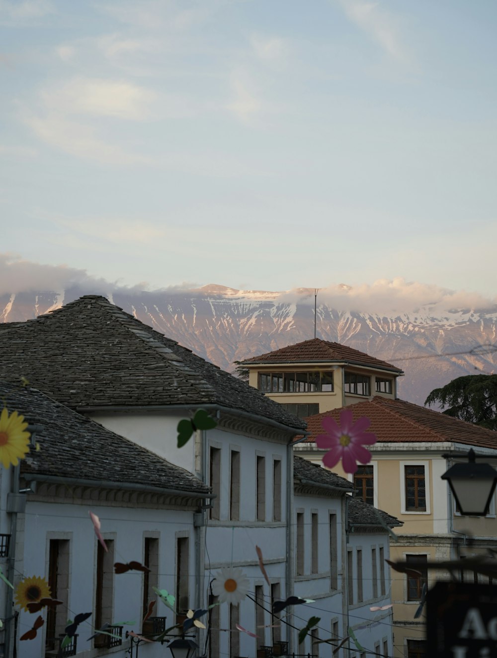 a building with a mountain in the background