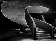 Architectural detail of a staircase emphasizing precision and structural clarity