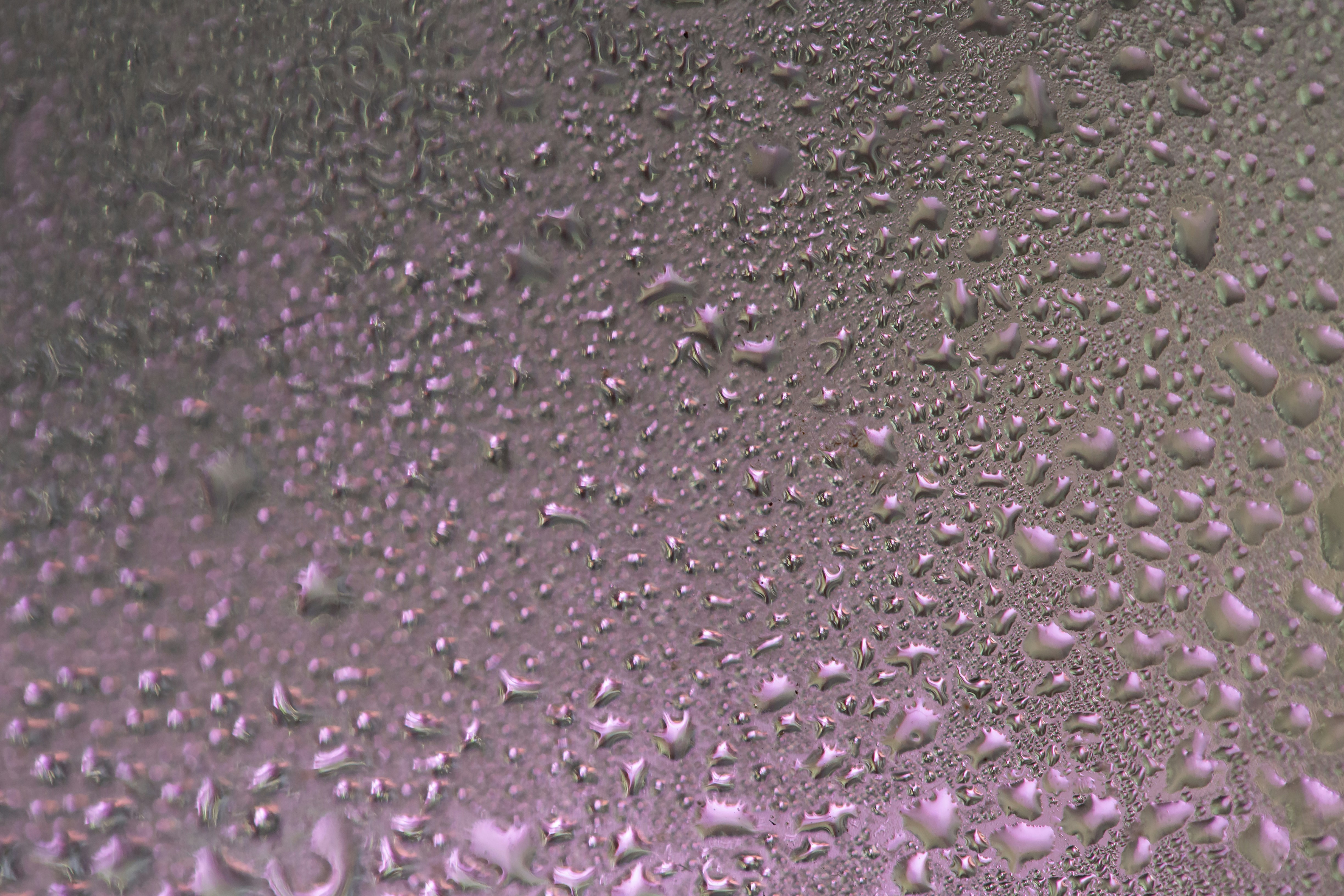 a close up of water droplets on a window