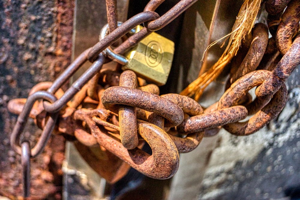 a close up of a chain with a padlock on it
